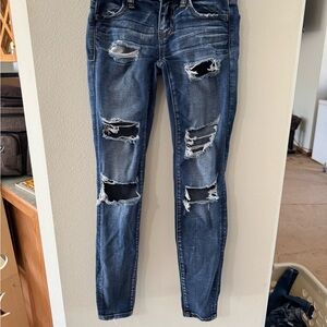 Distressed Blue Jeans